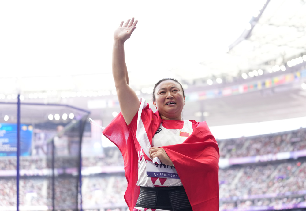 心怀梦想:田径选手斩获金牌 心怀梦想:田径选手斩获金牌